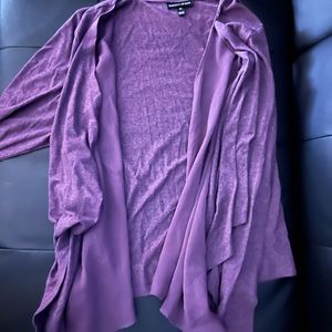 Long sleeve sweater. With ruffles down the side.